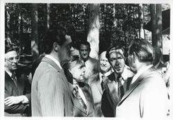 ["Black and white photograph print of Carl Albert, Leonid Brezhnev standing outside with several other men. House delegation trip. August 1975"]
