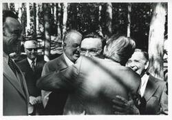 ["Black and white photograph print of Leonid Brezhnev hugging Edward Boland as Carl Albert and others watch. House delegation trip, USSR August 1975"]