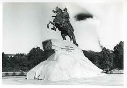 ["Black and white photograph print of a statue."]