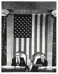 ["Gerald R. Ford's State of the Union message. Carl Albert and Nelson A. Rockefeller are seated behind Ford."]