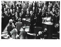 ["Gerald R. Ford's State of the Union message. Carl Albert and Nelson A. Rockefeller are seated behind Ford."]