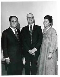 ["Carl Albert (second from left) shown with three other men at a farewell party for Mr. and Mrs. Dong Jo Kim (Korea)."]