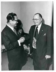 ["Mr. and Mrs. Dong Jo Kim at a farewell party in their honor."]