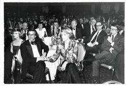 ["Joel Jankowsky and Roger Randle among a dinner group."]