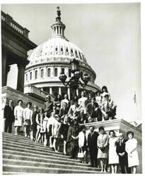 ["Carl Albert with a group on the Capitol steps. 1969"]