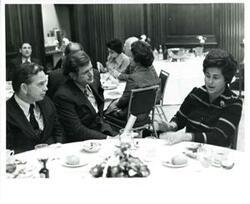 ["Carl Albert, Edward M. Kennedy, and Roz Wyman at a luncheon."]