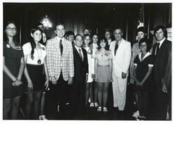 ["Clem McSpadden (fourth from right), Dewey F. Bartlett (third from left), and Carl Albert with the Oklahoma REC group. June 1973"]