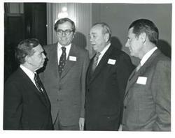 ["From left: Carl Albert, Joe Hatfield, unknown, and A. C. Smith at the National Broiler Council reception. March 1973"]
