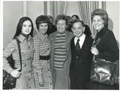 ["Carl Albert with unidentified people."]