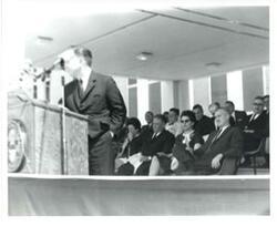 ["Carl Albert at a speaker's podium."]