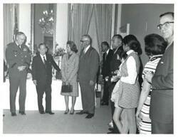 ["John N. Happy Camp (left), Carl Albert (center), and Page Belcher (right)."]