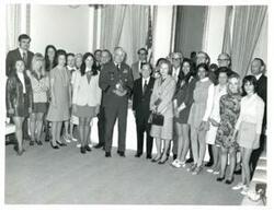 ["Carl Albert and his staff at a party."]