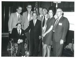 ["Carl Albert (center) with a group of people."]