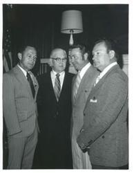 ["Tom Steed second from left."]