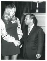 ["Carl Albert with unidentified people."]