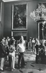 ["Black and white photograph print of Carl Albert and Mary Albert with several others walking in a museum during the House delegation trip. August 1975"]