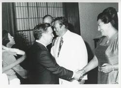 ["Black and white photograph print of Carl Albert with President Josip B. Tito of Yugoslavia and others."]