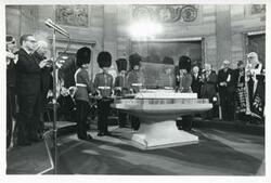 ["Black and white photograph print of ceremony honoring the arrival of the Magna Carta at the U. S. Capitol."]