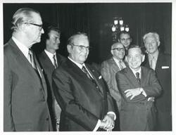 ["Black and white photograph print of Thomas P. O'Neill, Carl Albert, and President Josip B. Tito of Yugoslavia with several others in Albert's office. November 1971"]