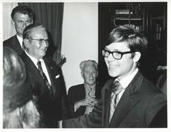 ["Black and white photograph print of President Josip B. Tito shaking hands with an unidentified girl. November 1971"]