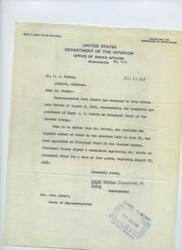 ["The document informs Mr. D. J. Wesley that Harry J. W. Belvin has been appointed as Principal Chief of the Choctaw Nation, after receiving the highest number of votes in an election held on June 21. President Truman signed a commission appointing Mr. Belvin for a term of four years starting on August 18, 1948. The document is signed by William Zimmerman, Jr., Acting Commissioner of Indian Affairs."]