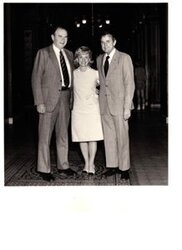 ["The image depicts Dewey Bartlett standing with Henry Bellmon and Paula Unruh in front of the Foreign Relations Office"]