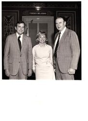 ["The image depicts Dewey Bartlett standing with Henry Bellmon and Paula Unruh in front of the Foreign Relations Office"]