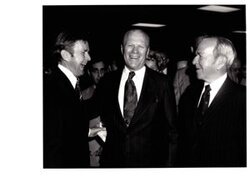 ["The image depicts Dewey Bartlett standing with Gerald Ford and another man"]