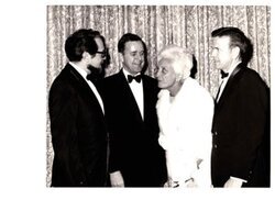 ["The image depicts Dewey Bartlett standing with Mrs. Oscar Hammerstein, George Nigh, and another gentlemen"]
