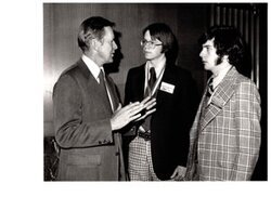 ["The image depicts Dewey Bartlett talking with Barry McBee and Mark Canon"]