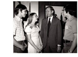 ["The image depicts Dewey Bartlett standing with Bill Corns, Barbara Craig, and Steve Tuel"]