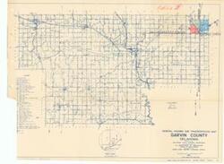 ["The General Highway and Transportation Map of Garvin County, Oklahoma, produced by the Oklahoma State Highway Department, features blue ink on white paper. Dimensions: 22 1/2 x 18."]