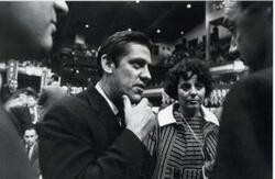 ["A campaign postcard with photo of Fred R. and LaDonna Harris At the top of the image is the phrase, A Team We Can Be Proud Of!"]