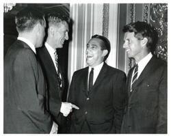 ["Freshmen senators occupy adjoining seats on the back row of the Senate chamber Left to right are Fred R. Harris, Joseph D Tidings, Robert F Kennedy, and Walter F Mondale July 1965"]
