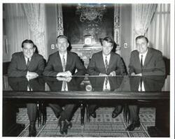 ["Fred R. Harris and Shirley Chisholm pose for a photo George T Kruse, photographer"]