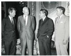 ["Fred R. Harris riding a combine with Henry Jo VonTungel (operating the combine) and Dan VonTungel This photo was taken in conjunction with the El Reno wheat hearings in June 1970"]