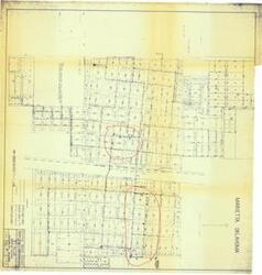 ["The document represents a map item is a watermain map of Marietta, Oklahoma and depicts the city's existing water supply system. Two areas of the map are circled in red ink. These areas contain the 1962 revisions of proposed fire hydrants, valves, and new mains. Watermain map (diazotype, blueline print); 34 9/16 x 35 5/8 inches; Annotations (circles; red, ink)."]