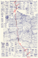 ["The map showcases a topographic representation of Haskell, Latimer, and Le Flore Counties in Oklahoma. It includes annotations marking the proposed route for Oklahoma State Highway 82, along with the cities that would be situated along this potential highway. The map measures 38 by 25 inches and is both inscribed and annotated."]