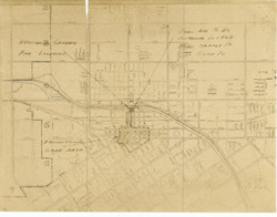 ["This map showcases a road map of Downtown Redlands, California, highlighting the location of a helicopter landing pad. An index card is attached, indicating the map's origin. The map is a dual spectrum copy and measures 8 7/16 by 11 inches."]
