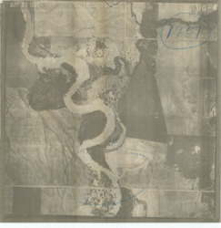 ["The aerial photograph showcases a section of the Deep Fork River located in Water District 4 of Okmulgee County. A portion of the river is highlighted with a blue pencil circle. This photograph was originally attached to Items 196, 197, and 198. It is a photostat measuring 8 x 7 15/16 inches, with a scale of 1:10,000, labeled OG-4, and includes inscriptions and annotations in blue pencil."]