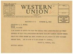 ["The document provides instructions for sending a telegram, specifying the class of service desired and providing accounting information. It also includes a sample telegram from A. N. Williams to E. E. Mizell informing him of the approval of a water facility planning project."]