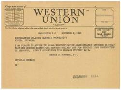 ["The document is a telegram sent on November 2, 1945, from George B. Schwabe to the Northeastern Oklahoma Electric Cooperative in Vinita, Oklahoma. The telegram informs them that a $185,000 loan for electric line construction has been approved by the Rural Electrification Administration. Schwabe requests acknowledgement of the message by mail."]