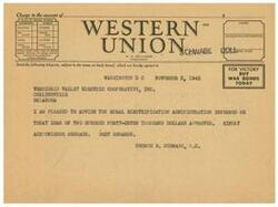 ["The document is a telegram from A. N. Williams, President of the Verdigris Valley Electric Cooperative, Inc., informing the recipient that a loan of $247,000 has been approved by the Rural Electrification Administration. The recipient is asked to acknowledge the message."]