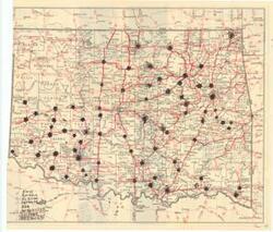 ["Create a concise and logical summary: This Road Map/Planning Map by the Oklahoma State Highway Commission highlights county seats in Oklahoma with stars and lists larger cities, featuring handwritten annotations on the back that include an itinerary of dates and cities for campaigning purposes.  Dimensions: Not specified in the provided information."]