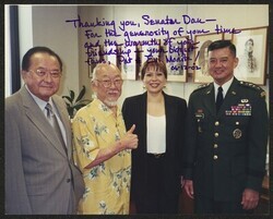 ["Signed on front: Thanking you, Senator Dan--for the generosity of your time and the warmth of your friendship. --your biggest fans, Pat & Evi Morita! 06-12-02. Information in title from back of photo."]