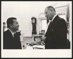 ["On post it on back: DKI giving Johnson a copy of his book Journey to Washington."]