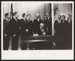 ["Caption: Signing Ceremony of Supplementary Military Appropriations Bill."]