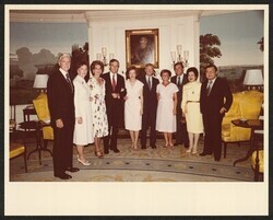 ["Also pictured: Senator Walter D. Huddleston, Mrs. Jean Huddleston, Senator Lloyd Bentsen, Mrs. B.A. Bentsen, Senator Ernest F. Hollings, and Mrs. Peatsy Hollings. Stamp: Official Photograph The White House Washington."]