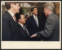 ["Caption: DKI with President Clinton and Sen. Kerry at FDR Memorial dedication February 11 1997. Stamp: Official White House photograph."]