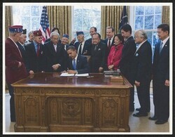 ["Caption: Bill signing at White House - Congressional Gold Medal honoring 100th Battalion, 442nd & MIS 10/5/10. Label: Official."]